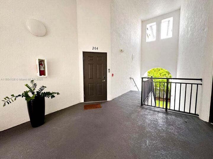 Property Photo: 15540 SW 136 St 204 FL 33196