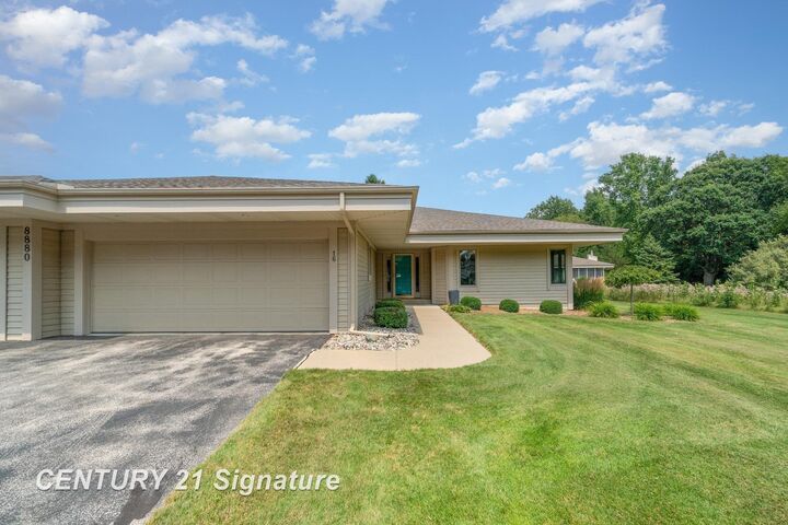 Property Photo:  8880 Windrush Court 16  MI 48609 