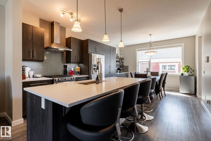 Property Photo: 7403 Colonel Mewburn Road NW AB T5E 6V7