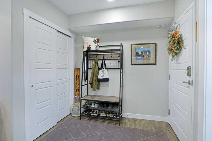 Property Photo:  499 Meadowlake Court E 208  AB T1R 0Y7 