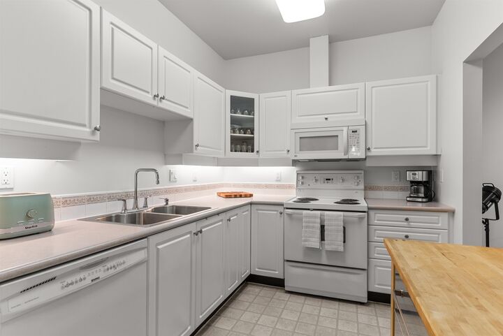 Property Photo: 4745 54A Street 110 BC V4K 2Z9