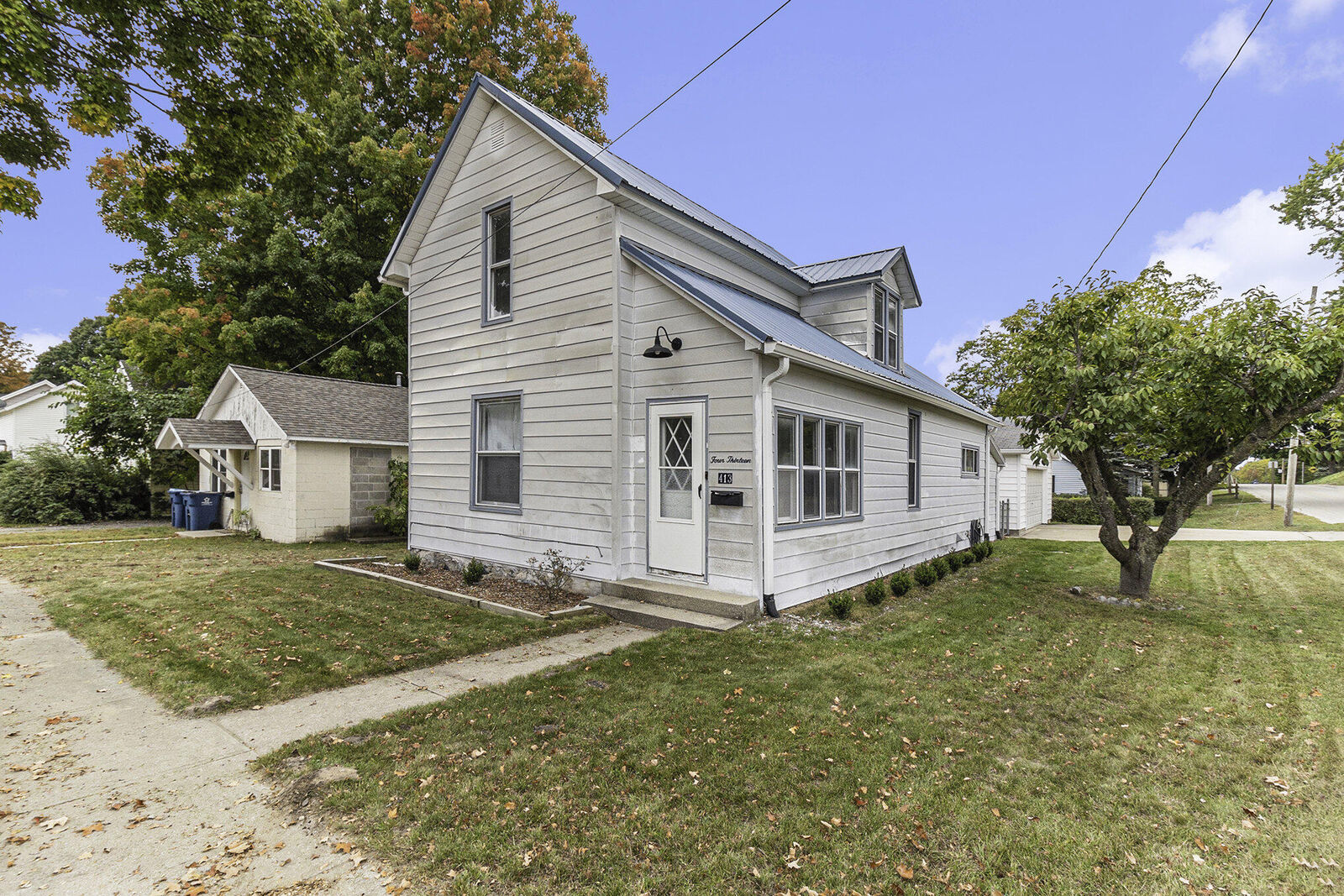 Property Photo:  413 N Maple Street  MI 49455 