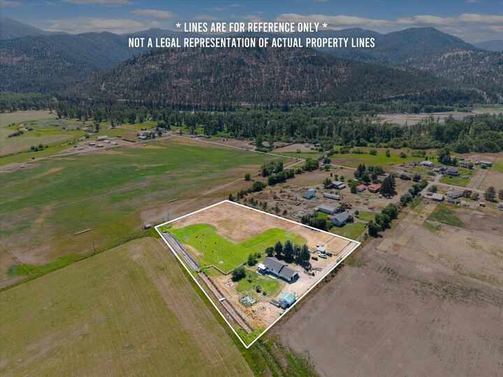 Property Photo:  13383 John Deere Road  MT 59808 