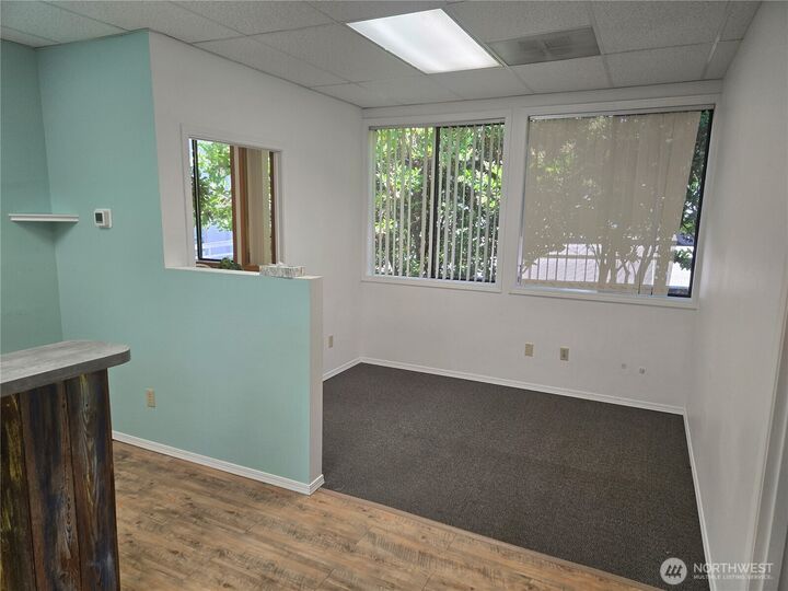 Property Photo:  1211  4th Avenue E 202  WA 98506 