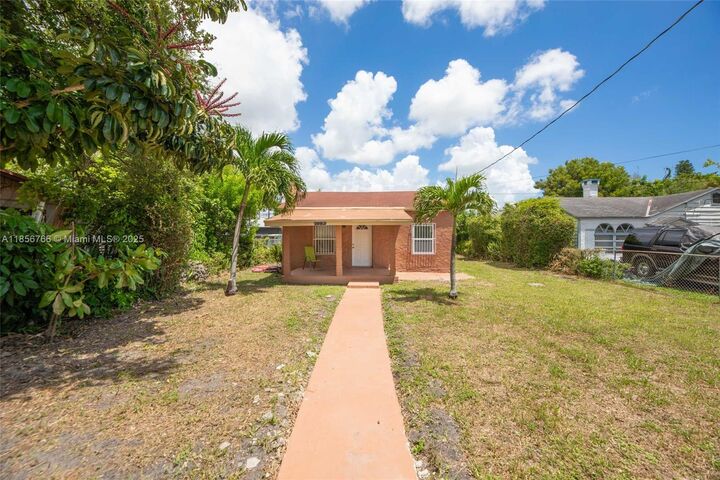 Property Photo:  1483 NW 58th St  FL 33142 