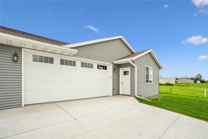 Property Photo:  201 William Way  IA 52315 