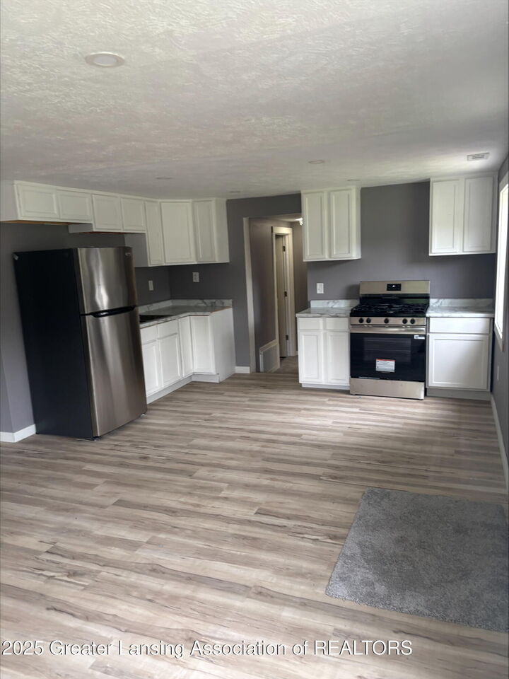 Property Photo:  720 Sawyer Road  MI 48911 