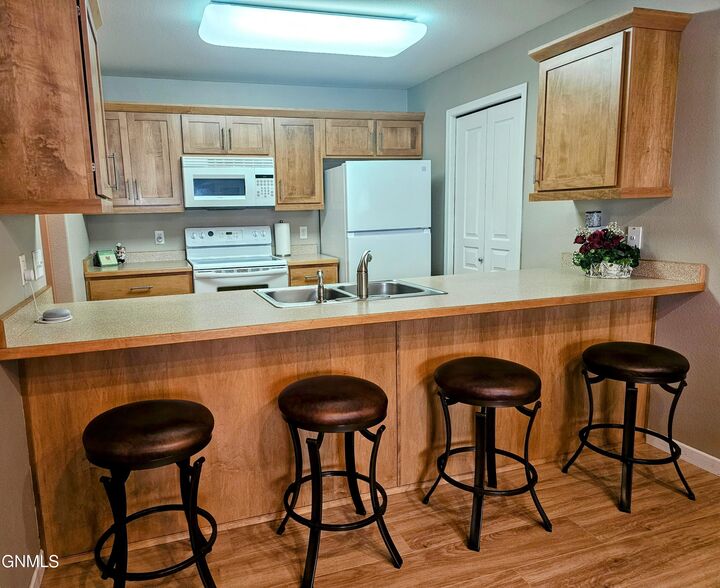 Property Photo: 2121 Sundancer Loop SE 3 ND 58554