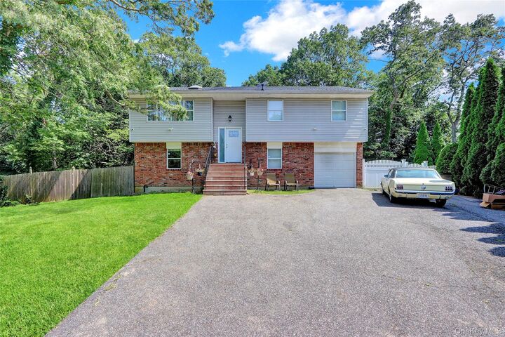 Property Photo:  100 Erlanger Boulevard  NY 11703 