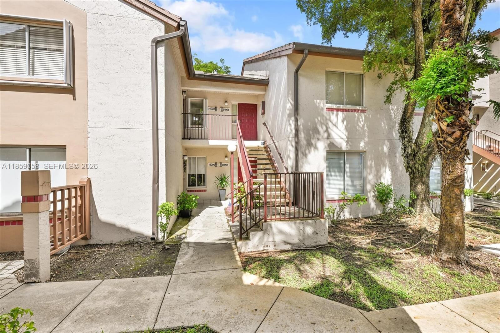 Property Photo:  14006 SW 91st Ter 14006  FL 33186 