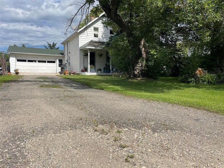 Property Photo:  100 Main Street  MB R0J 2C0 