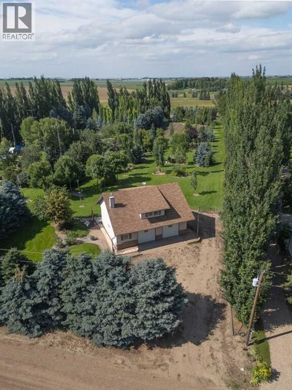 Property Photo: 145006 Cassils Road AB T1R 1B4