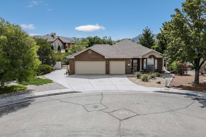Property Photo:  1120 Wind River Street SE  NM 87123 