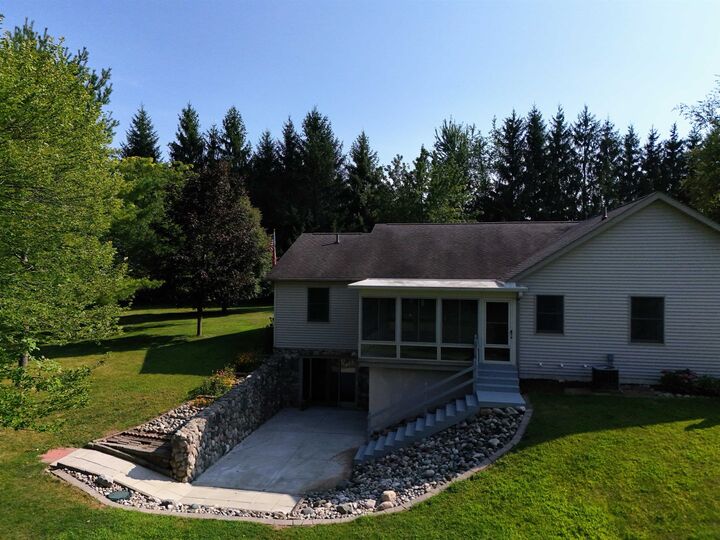 Property Photo: 1225 8 Mile Road MI 48631