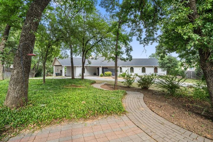 Property Photo:  8542 Meadowbrook Drive  TX 76120 