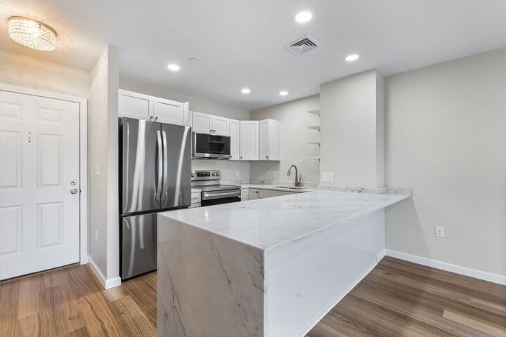 Property Photo: 64 Willard Street 406 MA 02169
