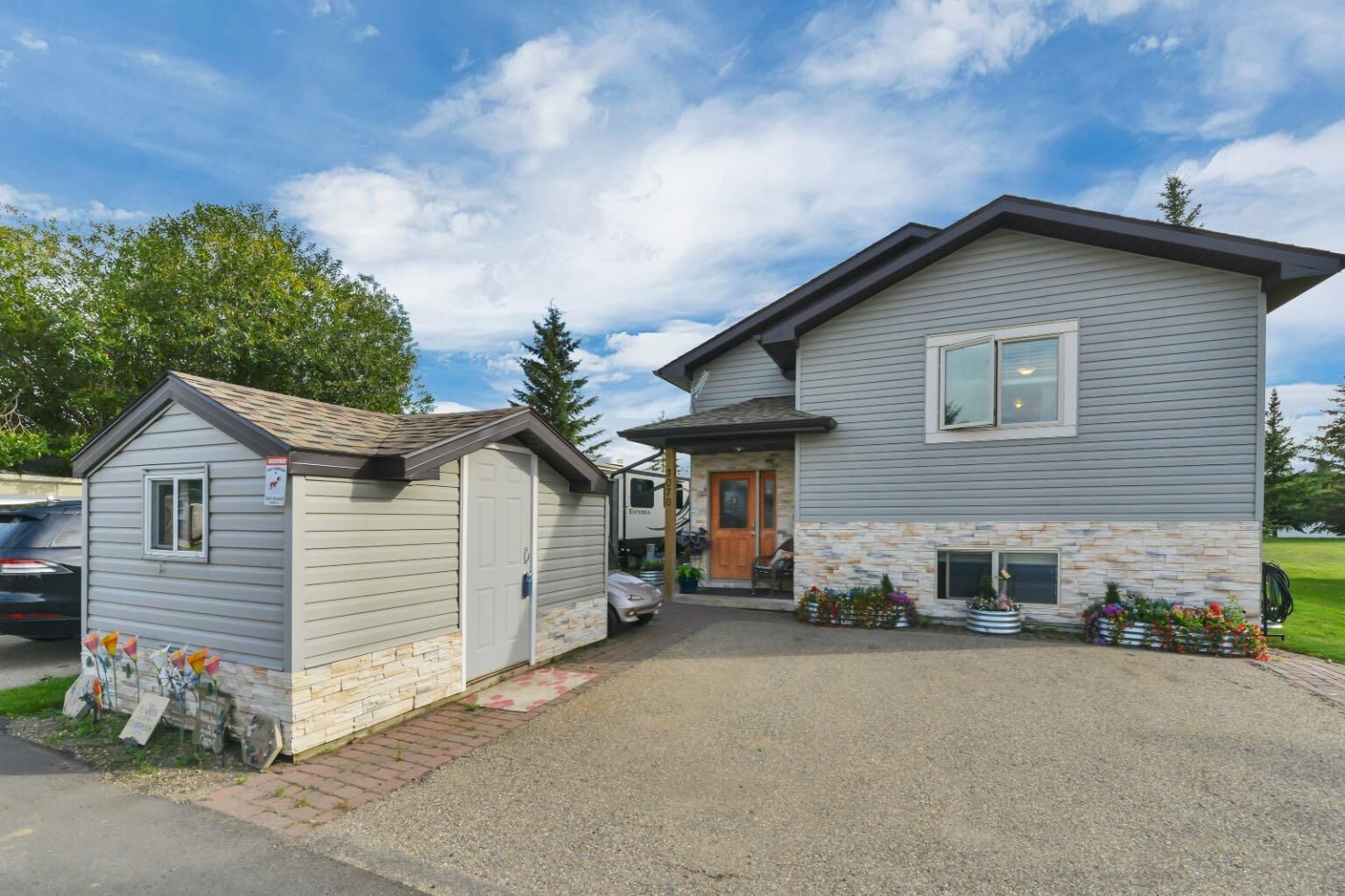 Property Photo: 25074 South Pine Lake Road 3070 AB T0M 1S0