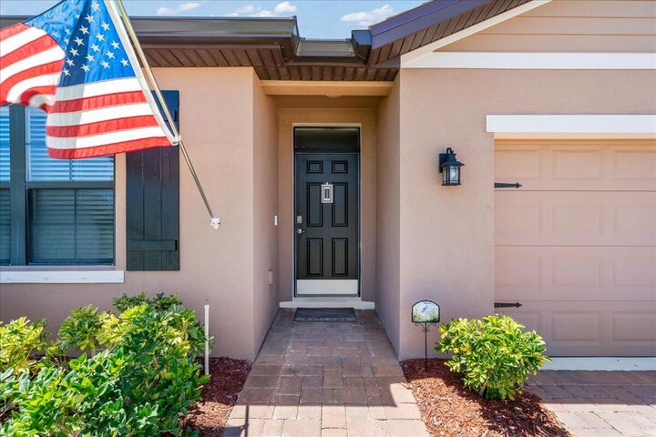 Property Photo:  7202 Tigereye Way  FL 32949 