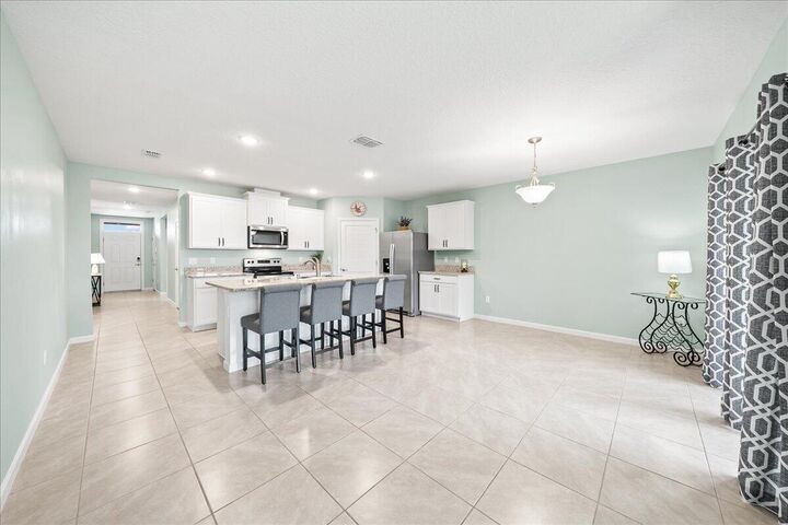 Property Photo: 7202 Tigereye Way FL 32949