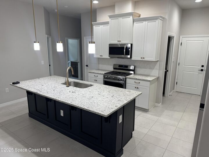 Property Photo:  8117 Tethys Court  FL 32940 