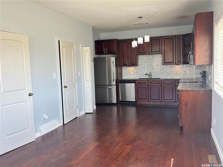 Property Photo:  1703 Patrick Crescent 8  SK S7W 0G1 