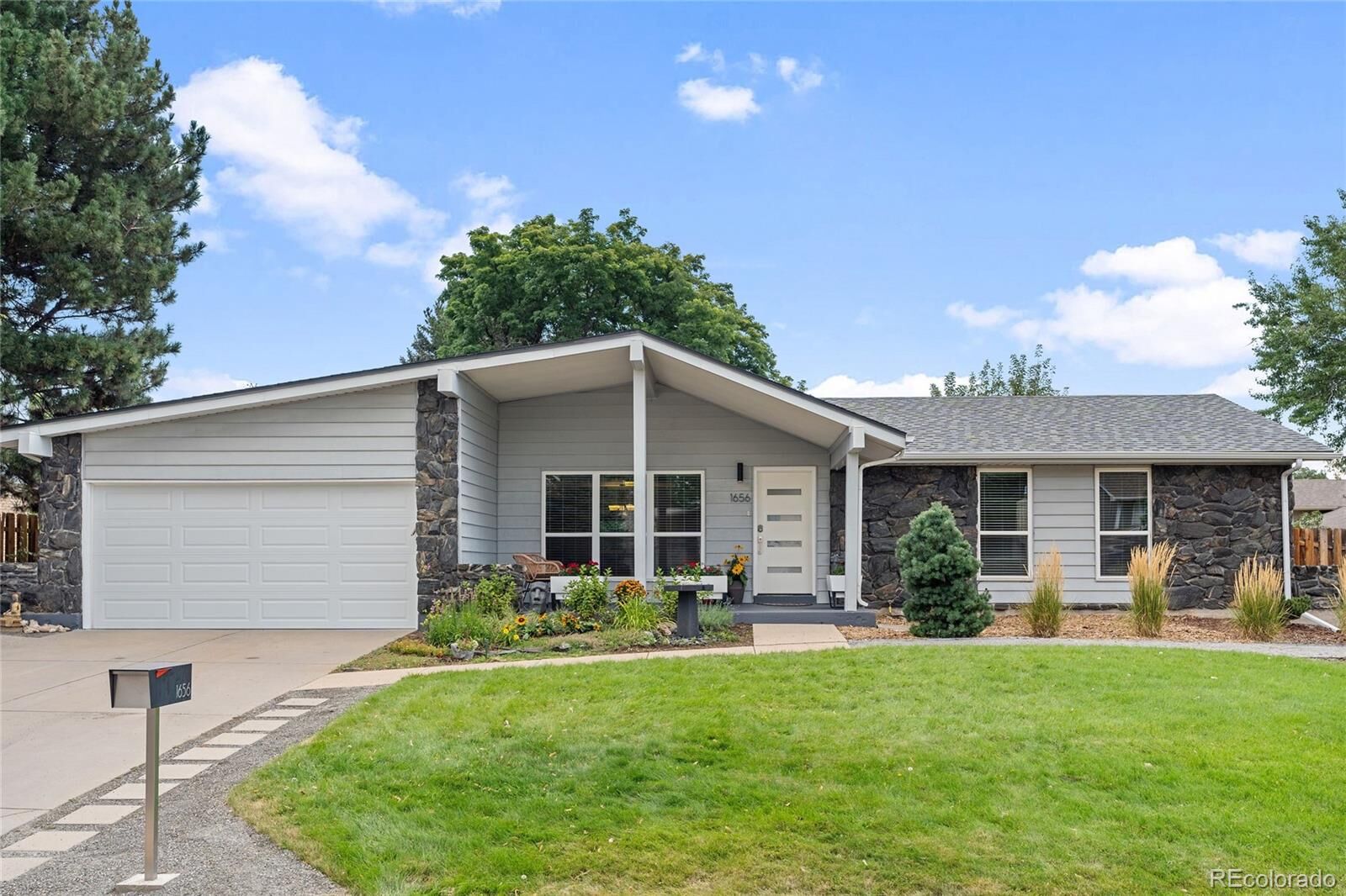 Property Photo:  1656 S Jellison Street  CO 80232 