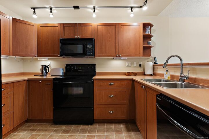 Property Photo: 9840 Fifth St 302 BC V9L 2X3