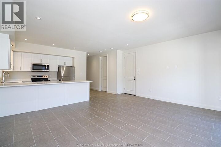 Property Photo:  233 Watson 103  ON N8S 3R8 