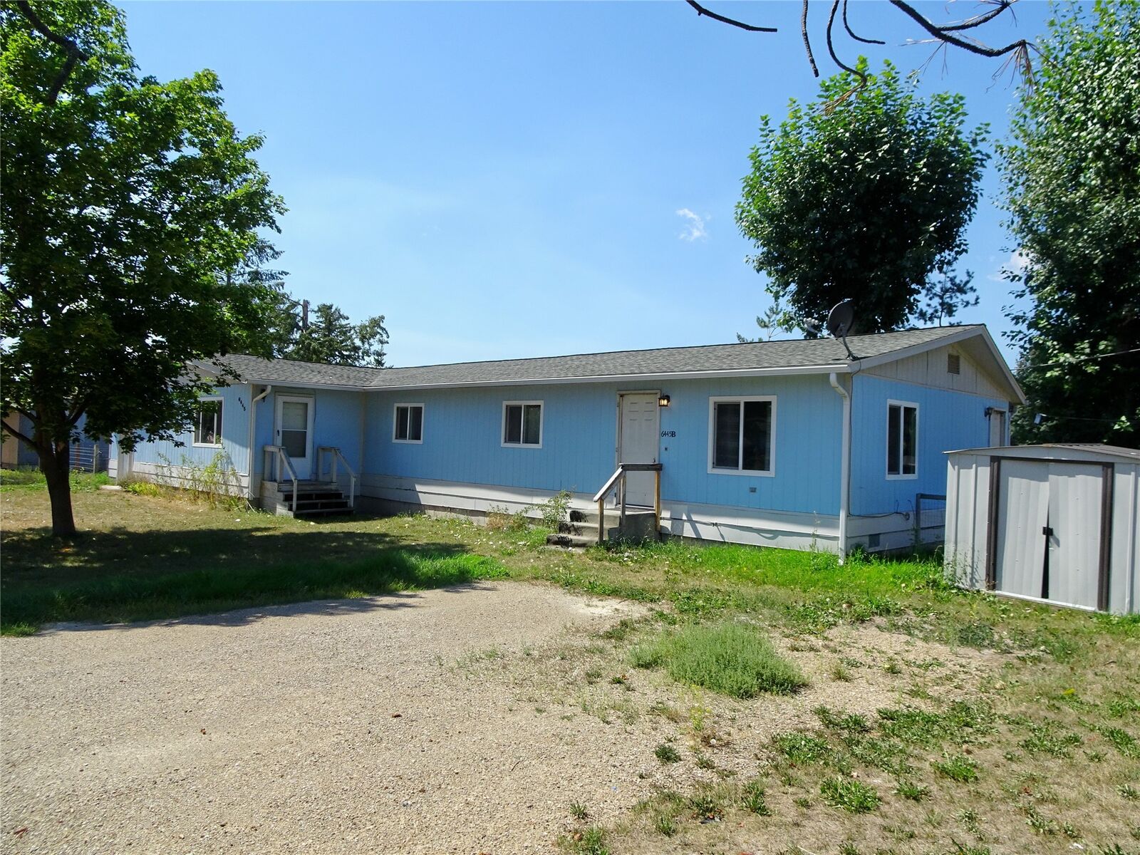 Property Photo:  6445 Mullan Road  MT 59808 