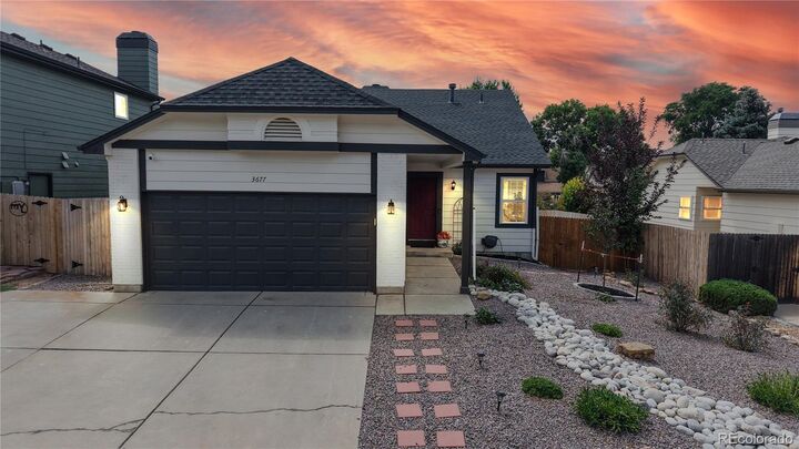 Property Photo: 3677 S Flanders Street CO 80013