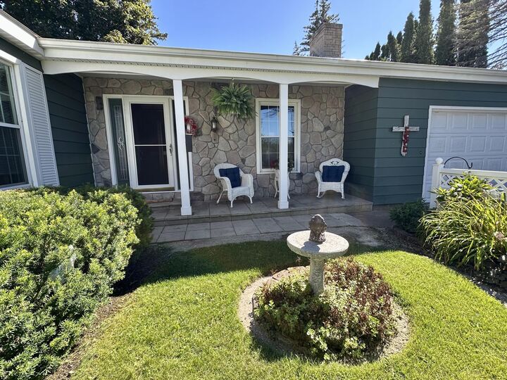 Property Photo: 444 Riverside Drive MI 49721