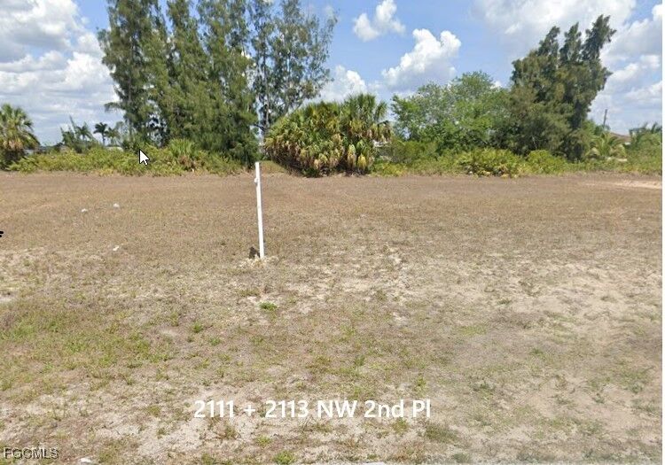 Property Photo:  2111 + 2113 NW 2nd Place  FL 33993 