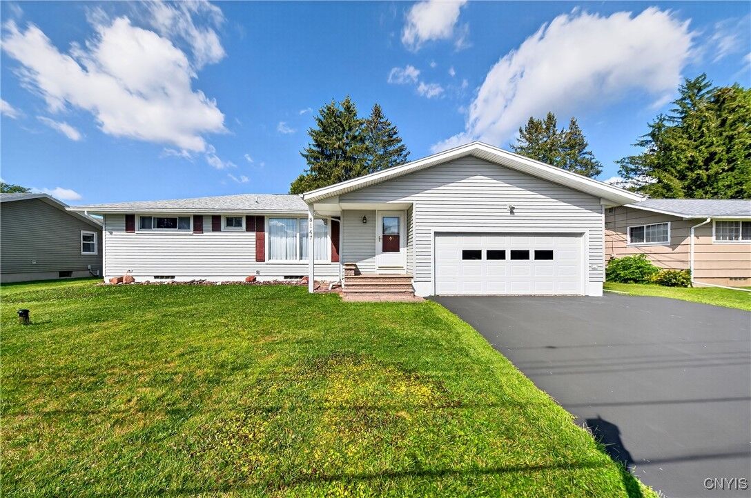 Property Photo: 8147 Brookwood Drive NY 13039