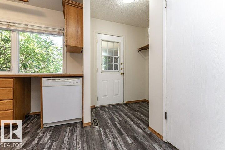 Property Photo: 3299 139 Avenue NW AB T5Y 1T2