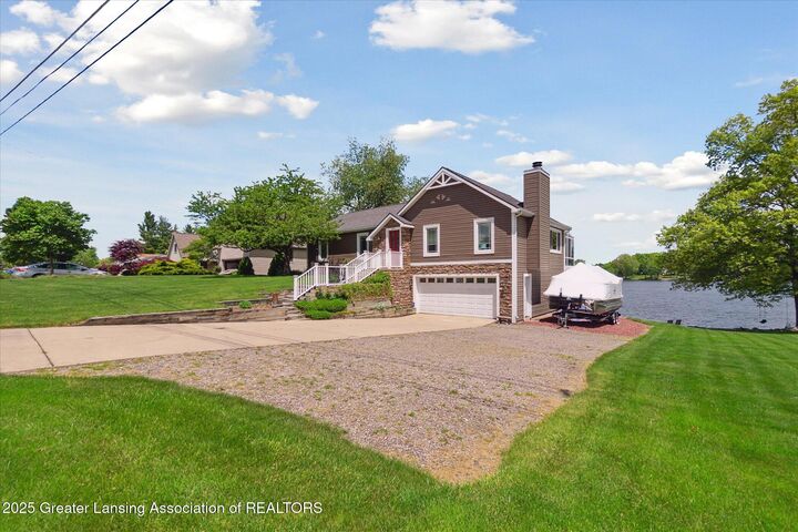 Property Photo: 6637 Victoria Shore Drive MI 48848