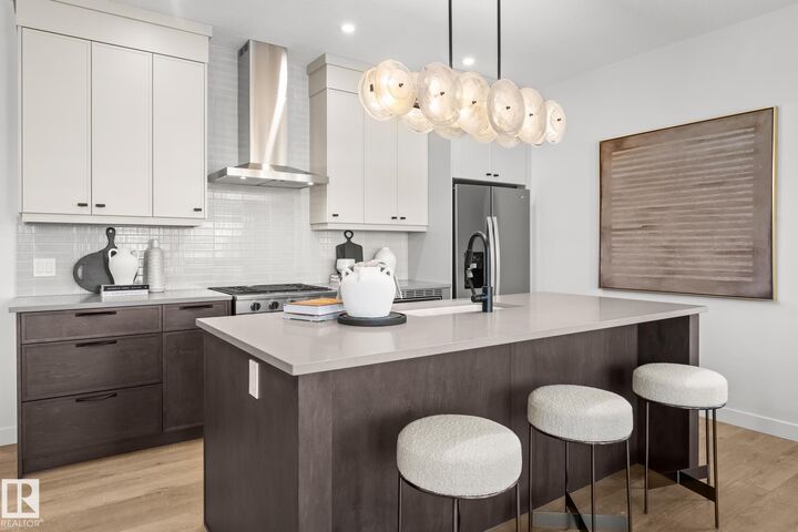 Property Photo: 2130 Muckleplum Crescent SW AB T6X 3G9