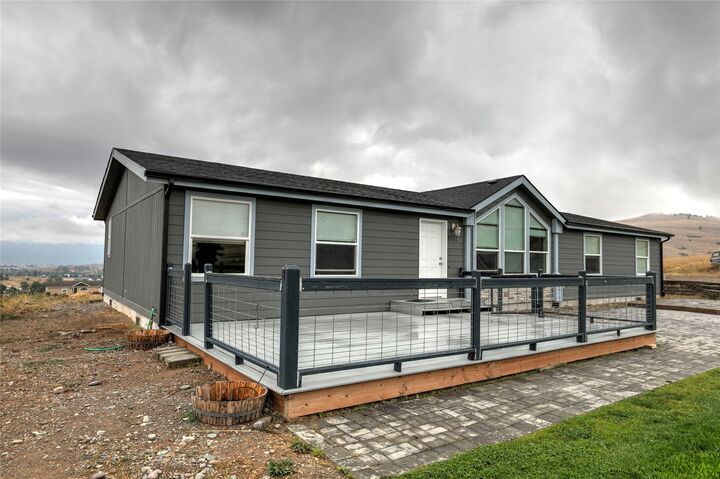 Property Photo: 8231 Karamu Lane MT 59808
