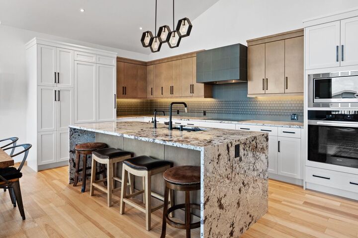 Property Photo:  232 Stewart Creek Rise  AB T1W 0L8 