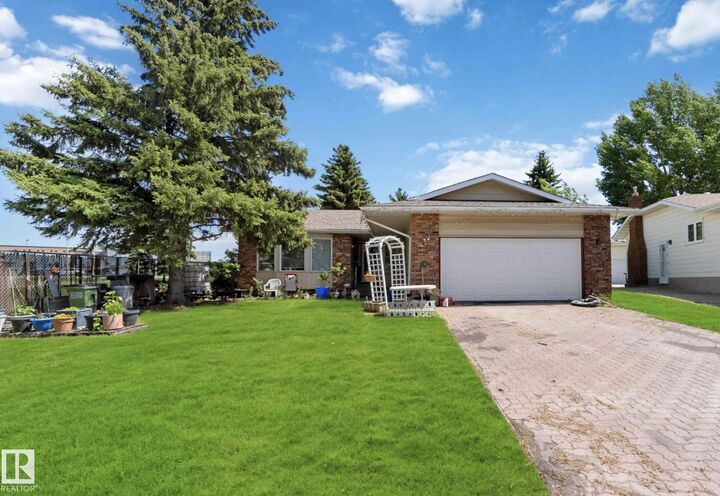 Property Photo:  2907 67 Street NW  AB T6K 1N2 