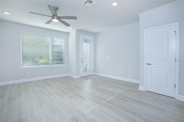Property Photo:  8669 Tavistock Lakes Boulevard  FL 32827 