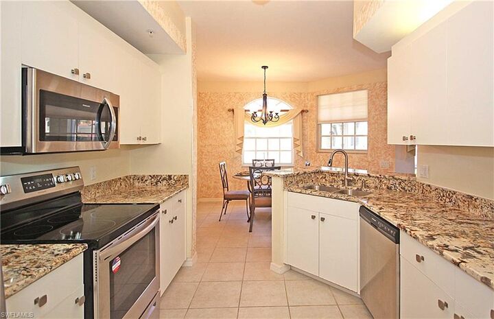 Property Photo:  500 L'Ambiance Cir 5-104  FL 34108 