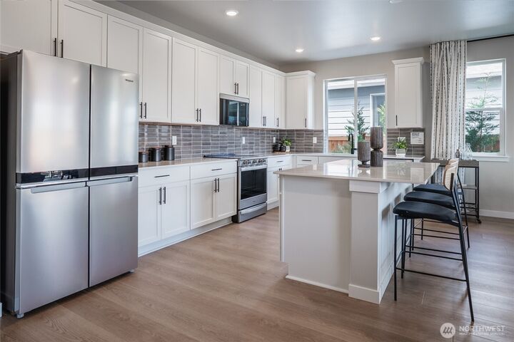 Property Photo:  13616  185th Street Ct E 104  WA 98374 