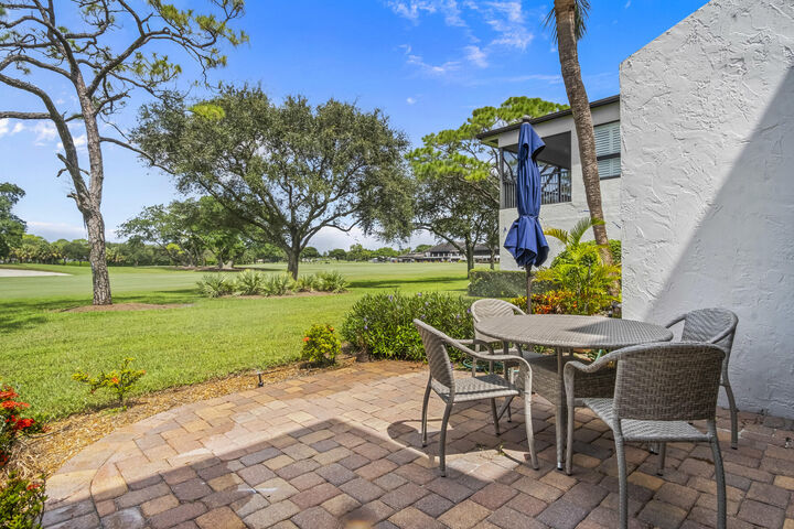Property Photo: 730 Greensward Court 105-J FL 33445