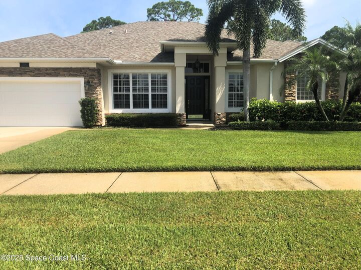 Property Photo: 1046 Wild Flower Drive FL 32940