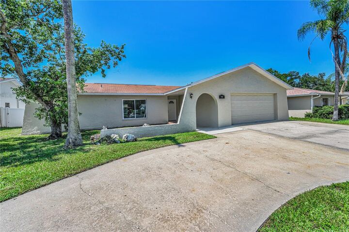 Property Photo: 11121 Peppertree Lane FL 34668