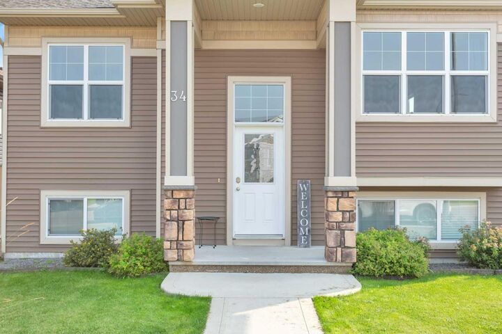 Property Photo: 34 Iron Wolf Court AB T4L 0E9