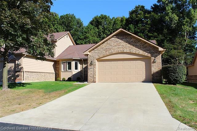 Property Photo: 30810 Misty Pines Drive 13 MI 48336