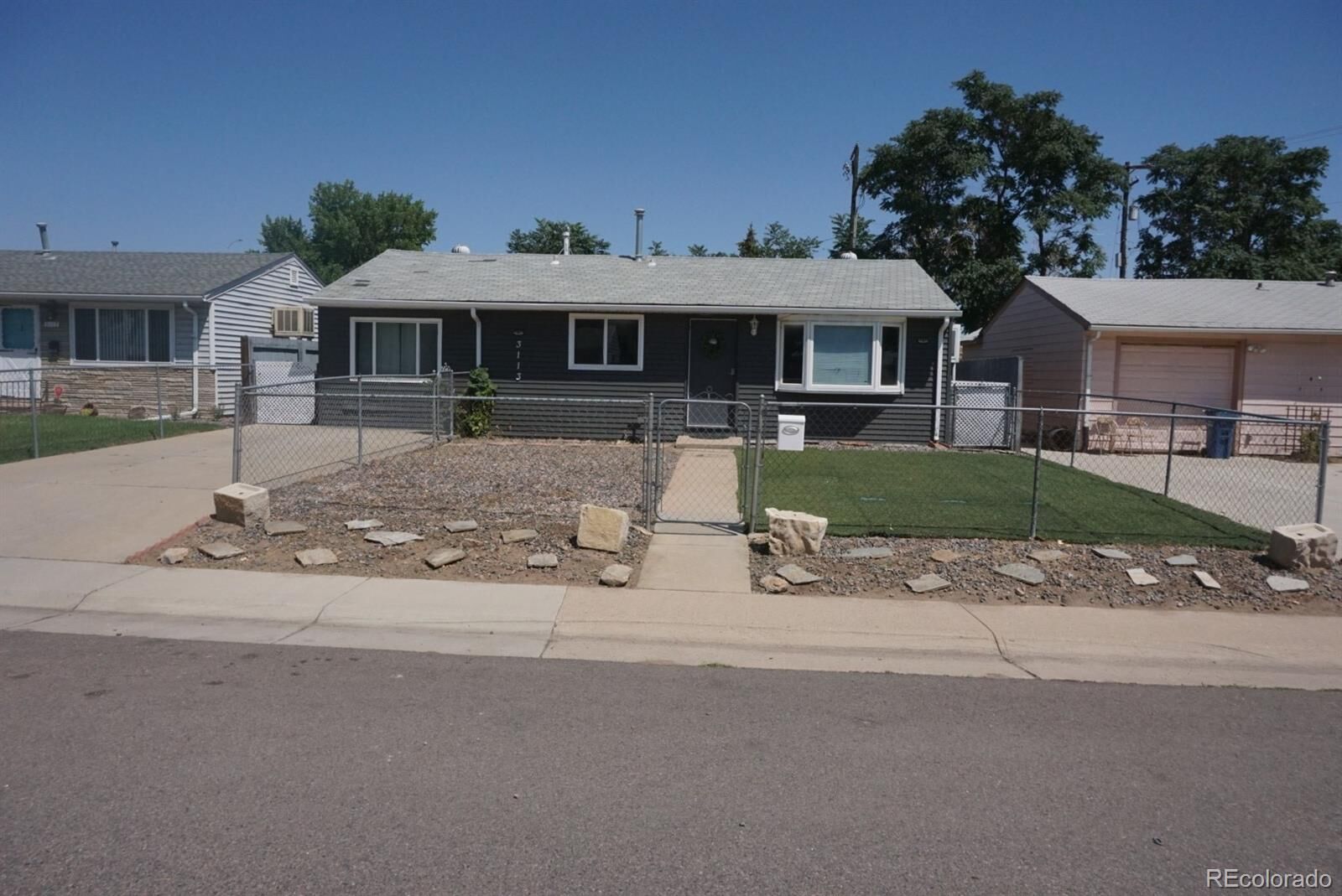 Property Photo: 3113 W Jefferson Avenue CO 80110