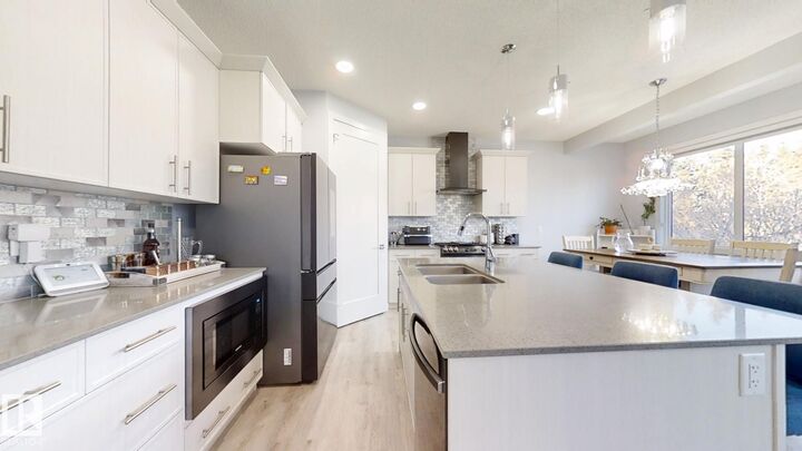 Property Photo: 215 Glenridding Ravine Road SW AB T6W 5C2