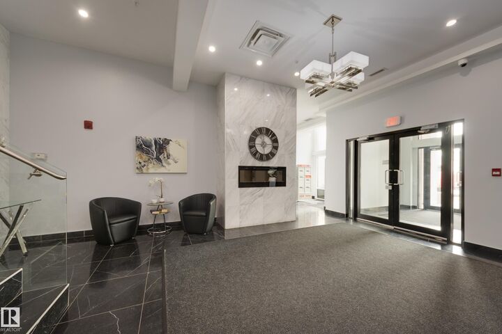 Property Photo: 1350 Windermere Way SW 403 AB T6W 2J3